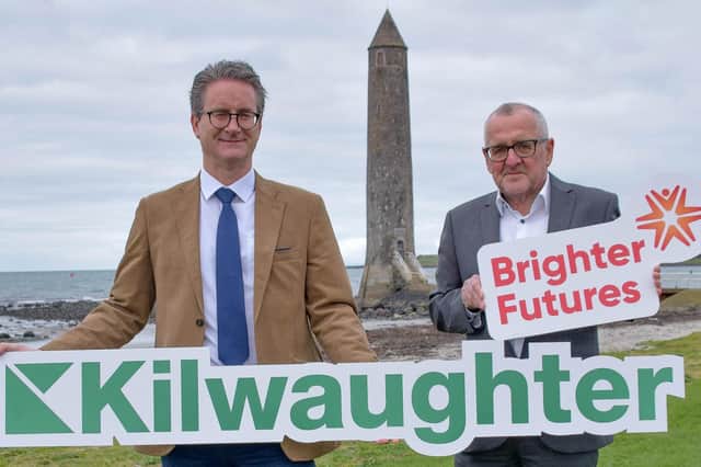 Gary Wilmot (left), CEO Kilwaughter Minerals, joins Gregg Humphrey, chairman Brighter Futures, to announce a donation of £20,000 to Larne Football Club’s official charity.