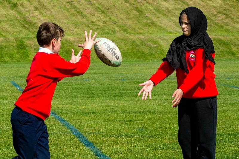 Learning about the rugby pass at the Shared Education event on Wednesday. PT23-243.
