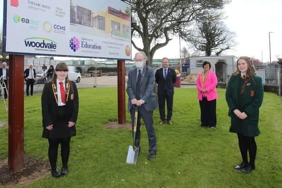 Former Education Minister Peter Weir cuts the first sod at the Limavady campus back in  April 2021. Credit NI World