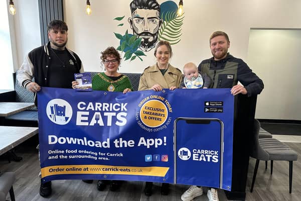 Carrick Eats founder Andrew Creighton (far right), Aron from Street Hawker, Mid and East Antrim Mayor Gerardine Mulvenna and Cheryl Brownlee MLA during the launch of the app.