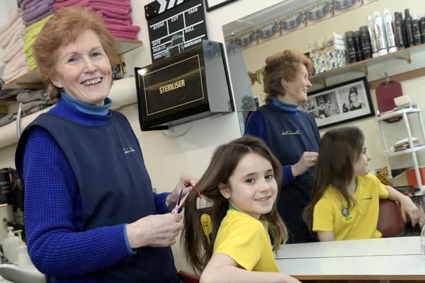 Henry Walker with hairdresser Diava Cairns. Photo: Paul Byrne Photography.