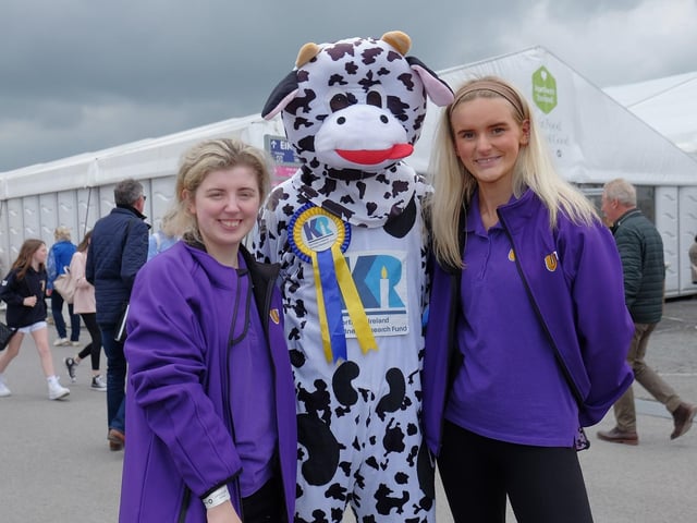 Northern Ireland Kidney Research Fund 's mascot Bella the Kidney Cow with U105's Madeiline and Samantha