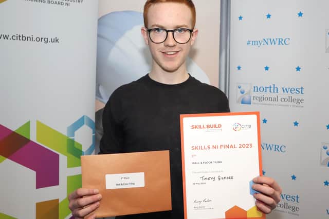NWRC student and Bronze medal winner in Wall and Floor Tiling, Timothy Gilmore pictured at the  CITB NI SkillBuild NI Finals at NWRC's Greystone Campus. 