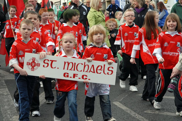 St Michael's GFC members step out along the route.