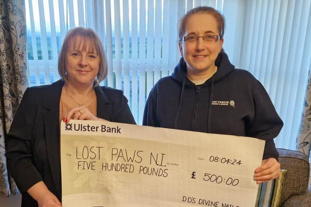 Finvoy Donna Dempsey presents Kathryn from Lost Paws NI with a cheque for £500. Credit Donma Dempsey.