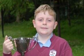 Cameron Moore of Upper Ballyboley Primary School was awarded the trophy for First Ballyclare Cub Scout of the Year in 2007.