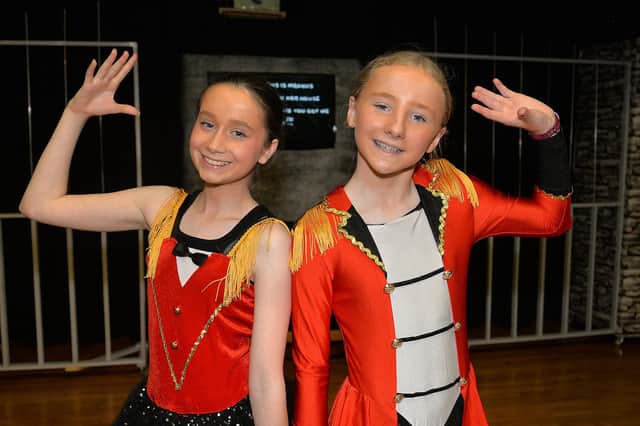 Playing an acrobat and an escapologist in the Lurgan Junior High School production of 'Matilda' are Heidi McTernaghan, left, and Amy Ellis. LM25-240.