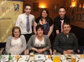 THREE UP THREE DOWN. Pictured at a 'Burns Night' held at Ballymoney RBL in 2010 and organised by  the Kingdom of Dalriada Ulster/Scots Society are (back left), Jonathan Crawford, Victoria Murray, Sam Crawford, Andrea White (front left), Yvonne White and Phil White.