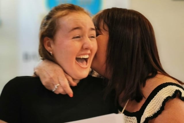 Aisling Trainor, a pupil at St John the Baptist's College in Portadown with her mum Shauna celebrating as she receives her GCSE results.