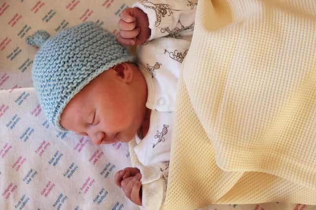 Baby Isaac McBride was born 40 seconds after midnight at the Royal Victoria Hospital, weighing 7lbs.