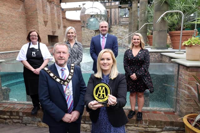Ald Stephen Ross, Lynsey Gordon, General Manager of the Rabbit Hotel and Retreat and Colin Johnston, MD of Galgorm Collection pictured with staff in the hotel’s Relaxation Burrow spa
