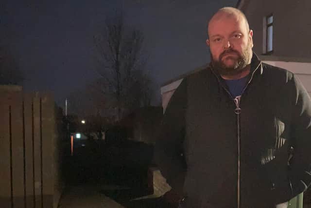 DUP Cllr Mark Baxter, who sits on Armagh, Banbridge and Craigavon Council, at Baird Ave, Donaghcloney where there is an issue with street lighting.