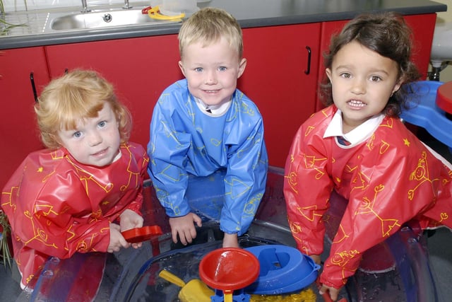 The water tray was a big attraction for new primary one pupils at Orchard County Primary School in 2007. Pictured here making a splash are, from left, Dilly, Glen Capper and Shania Velazquez-Smyth.
