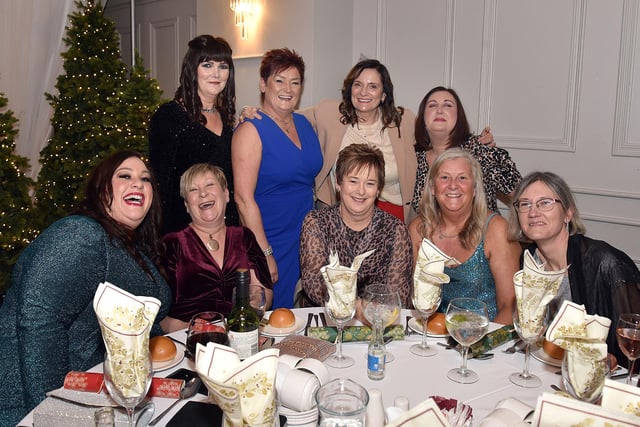 Staff from Killicomaine Junior High School, Portadown, who enjoyed the Seagoe Hotel Christmas party night on Saturday, December 9. PT51-216.