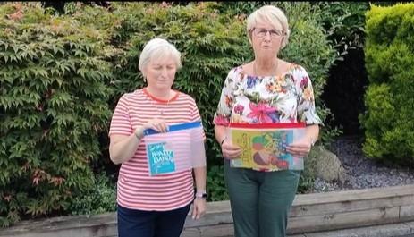 Largymore Primary Principal launches summer book project, leaving books for children in parks throughout Lisburn