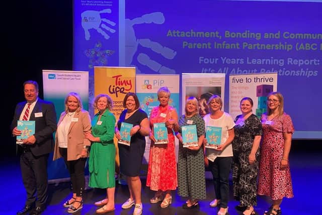 Pictured at the ABC PiP event; (L to R) South Eastern Trust Chairman, Jonathan Patton, ABC PiP Infant Mental Health Keyworker, Bronagh McCabe, ABC PiP Service Coordinator Infant Mental Health, Janine Dougan, Barnardo’s Director, Michelle Janes, Assistant Director Children and Young Peoples’ Health, Julie Kilpatrick, CEO Tinylife, Alison McNulty, Children’s Service Manager Barnardos (ABC PiP) Roberta Marshall, Tinylife, Emma O’Neil, ABC PiP Key Worker, Lauren Grey.  Pic Credit: SEHSCT