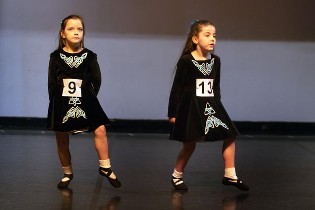 Erin McCaffery, left, and Fianna McConville taking part in the under 8 years Light Double Jig at the Portadown Folk Dancing Festival. PT10-221.