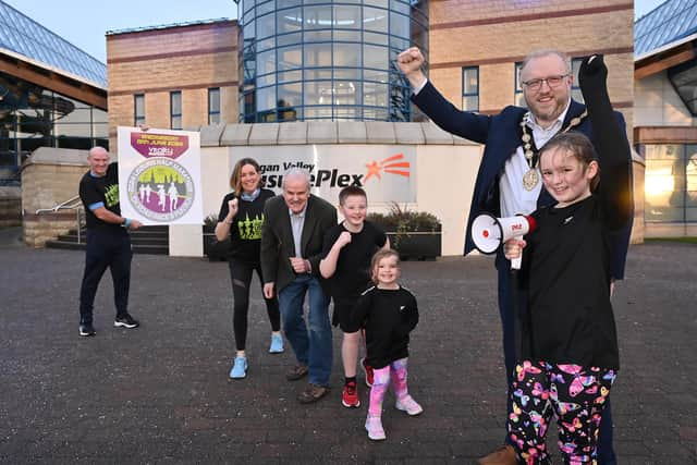 Runners with Chair of Communities & Wellbeing Committee, Councillor Thomas Beckett and Mayor of Lisburn & Castlereagh City Council, Councillor Andrew Gowan. Pic credit: Lisburn and Castlereagh City Council