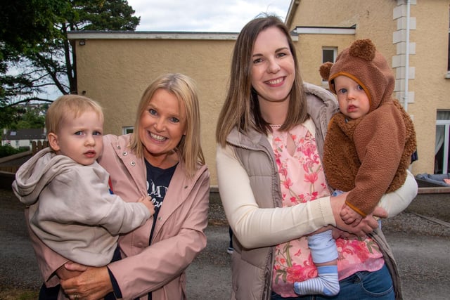 Posing happily for our photographer at the Loughgall Community Fun Night are from left, Isiah Smith (1), his gran, Lorna Glass, Sharon Gilpin and son Tommy (10 months). PT24-203.