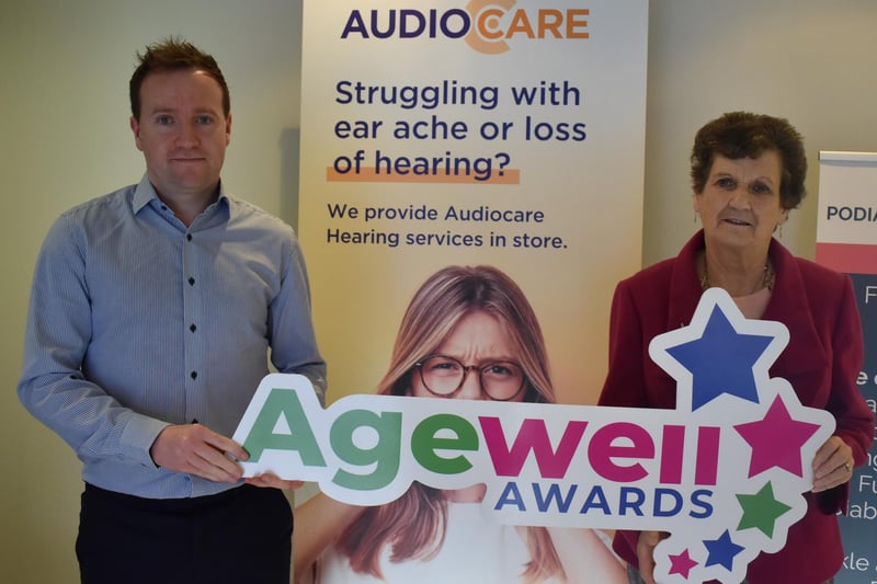 Agewell trustee Eve Booker with award sponsor, Audio Care, Ballymena
