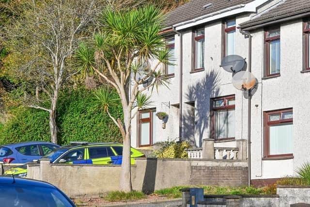 PSNI officers in the Antiville area of Larne after a sudden death was reported last Thursday. Credit: Presseye