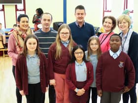 St Patrick’s Primary School P6 pupils and teachers at the Cultural Awareness event - Mrs Cush, Mr O’Farrell, Mr Hyndman and Mrs Lupari pictured with Ann Marie Convery, NI Housing Executive. Pic: John Stafford
