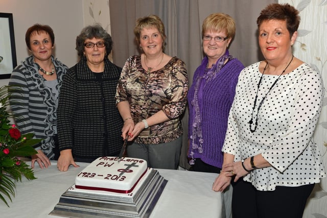 Valerie Tweedie, president, cuts the cake at the First Larne Presbyterian Women's 90th anniversary celebration dinner in Larne Masonic Centre also pictured are (from left) Margaret Boyle, Margaret Lindsay, leader ,Sharon Hollinger and June Bryson. INLT 07-011-PSB