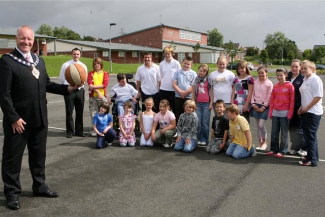 Then Carrick Mayor, Alderman David Hilditch, visiting Ulidia Integrated College, which was hosting the council's 2007 summer scheme.
