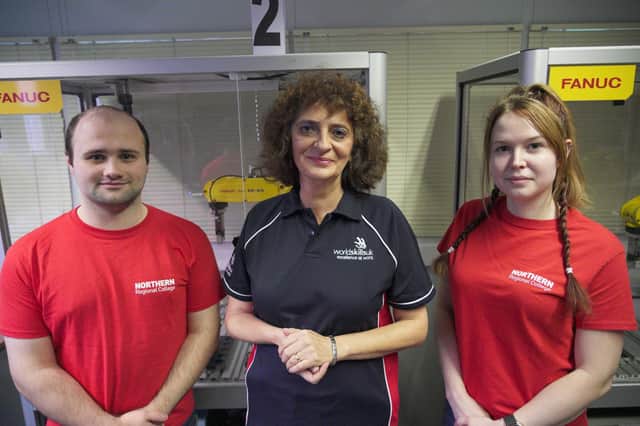 Northern Regional College students who have qualified to represent the College in the Industrial Robotics category at the WorldSkills UK national finals this week with their lecturer, Karla Kosch.  From left to right, Peter O’Neill, Karla Kosch and Hannah Currie. Credit NRC