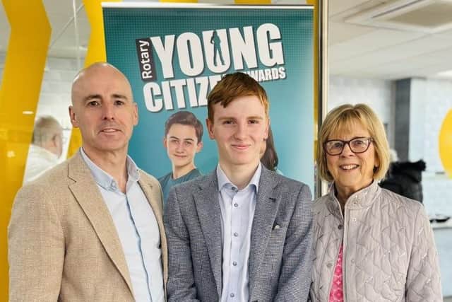 Jude Williams (centre) pictured with his dad Ryan Williams and grandmother Marie Williams, founder of the Sunshine Foundation for which he has raised money. CREDIT ROTARY