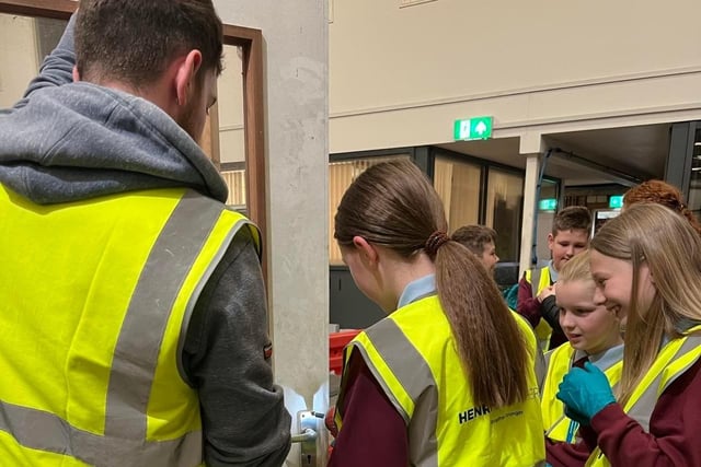 Pupils from Woods PS are shown around Henry Brothers headquarters in Magherafelt.