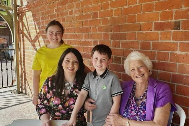 Rosa, Melanie and Timothy Bond with Lady Mary Peters. Pic credit: Melanie Bond