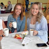Pictured at the Thomas Street Methodist Youth Fellowship coffee morning on Saturday are from left, Dolores Cassidy, Lisa Duke and Sophie Duke. PT26-216.