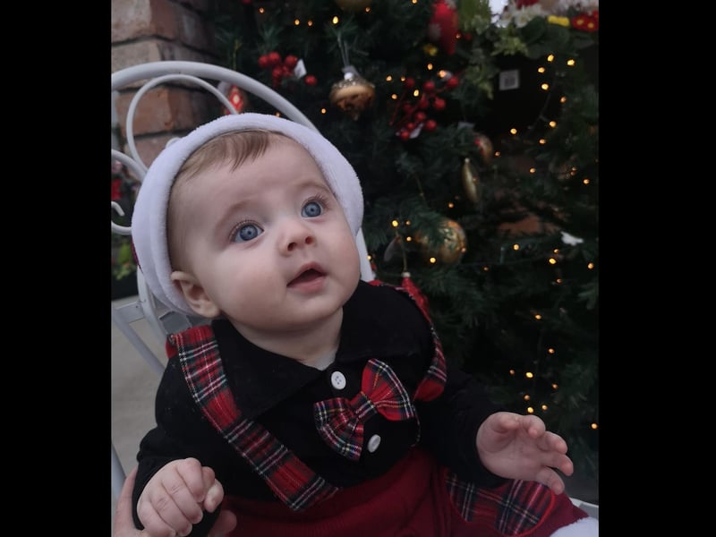 This little one is eagerly awaiting Christmas.