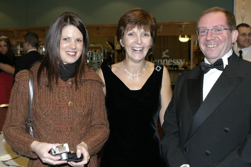 LOOKING GOOD. Principal of Ballymoney High, Rodney Scott, pictured along with teachers, Elaine Cameron and Hazel Ramage at the school formal in 2006