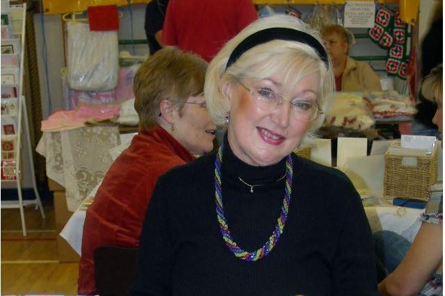 Christine Andrews behind one of the stalls at the 2006 Christmas variety fair in Downshire School. ct46-302fm.