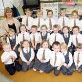 Harmony Hill Primary One Classroom Assistant Miss Georgina Kidd and Teacher Mrs Linda Grimason and her Primary One Class pictured in 2008