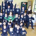 Schools organiser Jenny Ferguson from  the NSPCC at Carr Primary School in 2006 to receive a cheque for £571 raised through a charity workout in the school