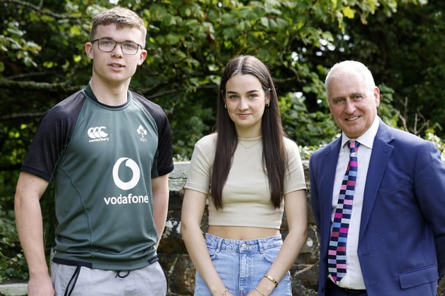 Mr Brady with top achievers Niall Hynds (3A*) and Molly O'Neill (2A* 1A).