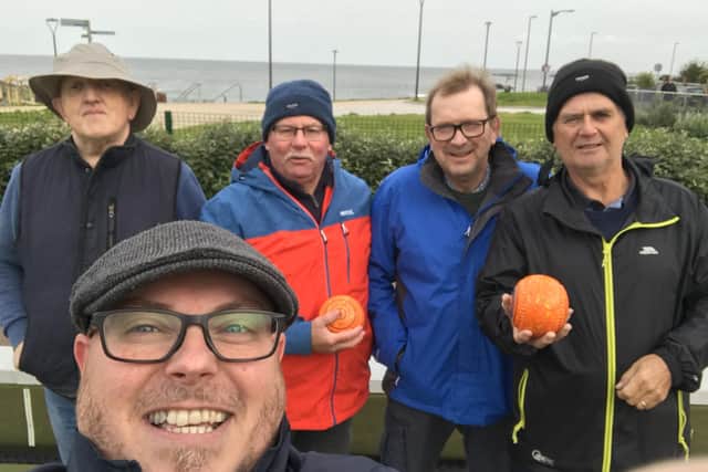 Sam (second from left) and Alan (far right) pictured at Portrush Bowling Club alongside Causeway Coast VI Bowls teammates Norman and Richard. Taking the selfie is Jonathan Adams, RNIB Community Access Worker. Credit RNIB