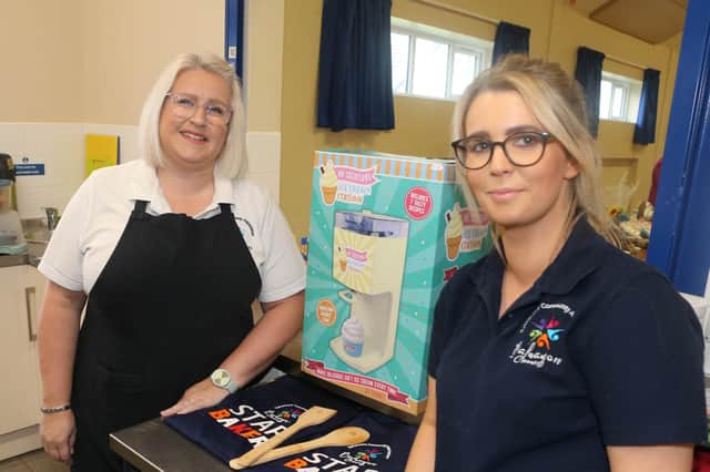 Gemma Moore and Stacy McClarty with the prizes pictured at the Balnamore Community Association Autumn Fair in the Community Centre