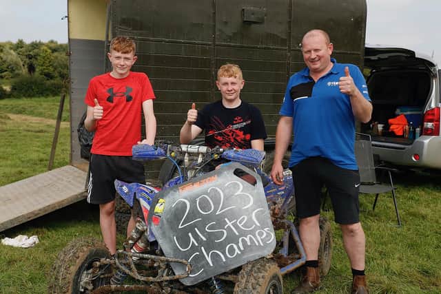 Tandragee’s Jack Minish pictured with his dad Jeff and brother Harry after winning the Clubman Quad Ulster Championship. (Pic supplied by Maurice Montgomery).
