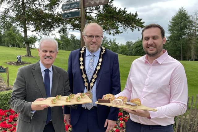 Councillor Thomas Beckett alongside Councillor Andrew Gowan and owner Philip Davison. Pic credit: Courtesy of The Hills Bar and Restaurant