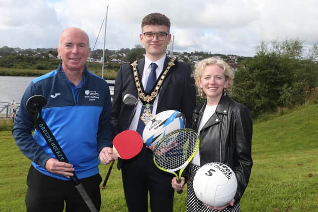 Mayor of Causeway Coast and Glens, Councillor Ciarán McQuillan, launches the Online Sports Directory alongside Stephen McCartney, Sports Development Manager and Pat Mulvenna, Director of Leisure and Development. CREDIT CCG COUNCIL