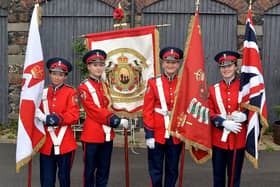 Standard bearers for Upper Bann Fusiliers Flute Band pictured before the Battle of the Somme Commemoration Parade in Lurgan on Saturday evening. Included are, from left, Oivia Twinem, Emily Blair, Heather Healey and Amelia Wells. LM 27-217. Photo by Tony Hendron