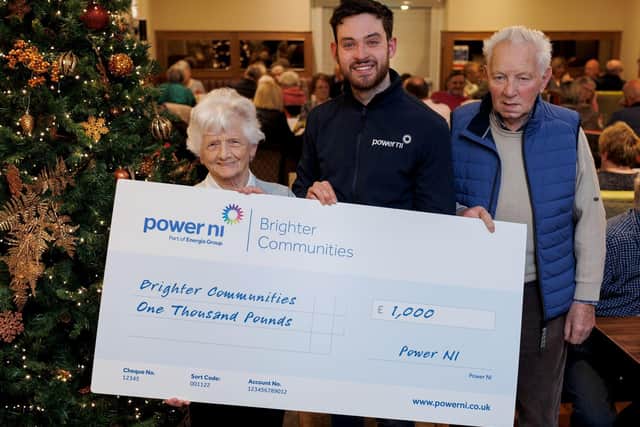 Pictured (L-R) is Clabby Community Resident Ruby Curry, Power NI representative Barry Rogan, and Clabby Community resident Hugh Hooper.