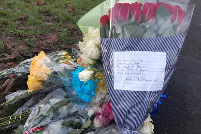 Floral tributes to Odhrán Kelly from his mother Jacqui and brother Paul amid other tributes from friends and the community following the tragic murder of the 23-year-old nursing assistant in Lurgan, Co Armagh on December 3, 2023.