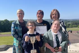 Carole Johnston-Thompson, a parent who nominated the school for the award; Mrs Edel Lavery, Principal; Mrs Tori Kirk, Donard staff member; Carly McCann and Lucy Cunningham, pupils.