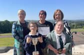 Carole Johnston-Thompson, a parent who nominated the school for the award; Mrs Edel Lavery, Principal; Mrs Tori Kirk, Donard staff member; Carly McCann and Lucy Cunningham, pupils.