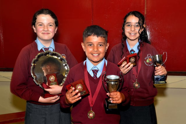 Some of the subject prize winners at the  Ballyoran Primary School prize day,  from left, Aisling Hughes, Literacy award, Kacper Skwara, Drama and Numeracy, and Isabella Pereira, star pupil and ICT. PT23-249.  Photo by Tony Hendron